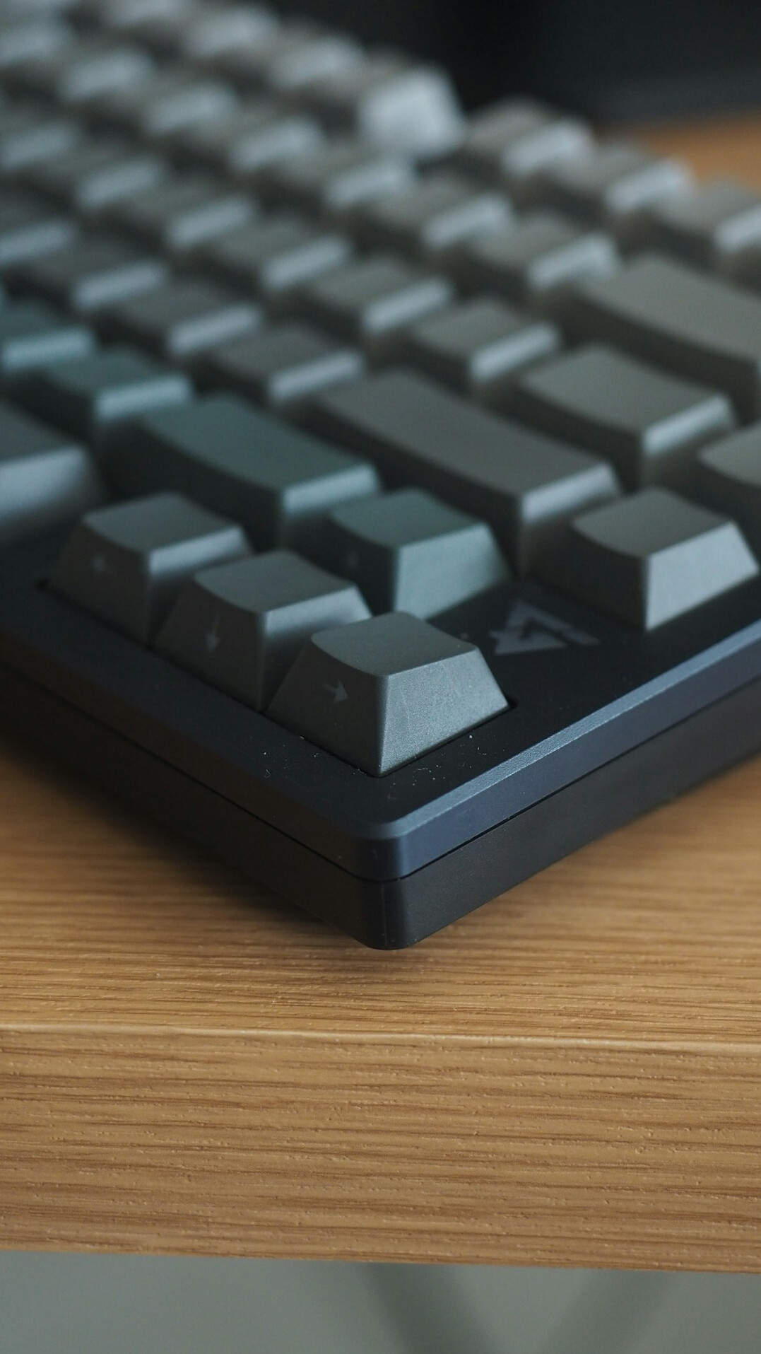Close-up of hands typing on a laptop keyboard